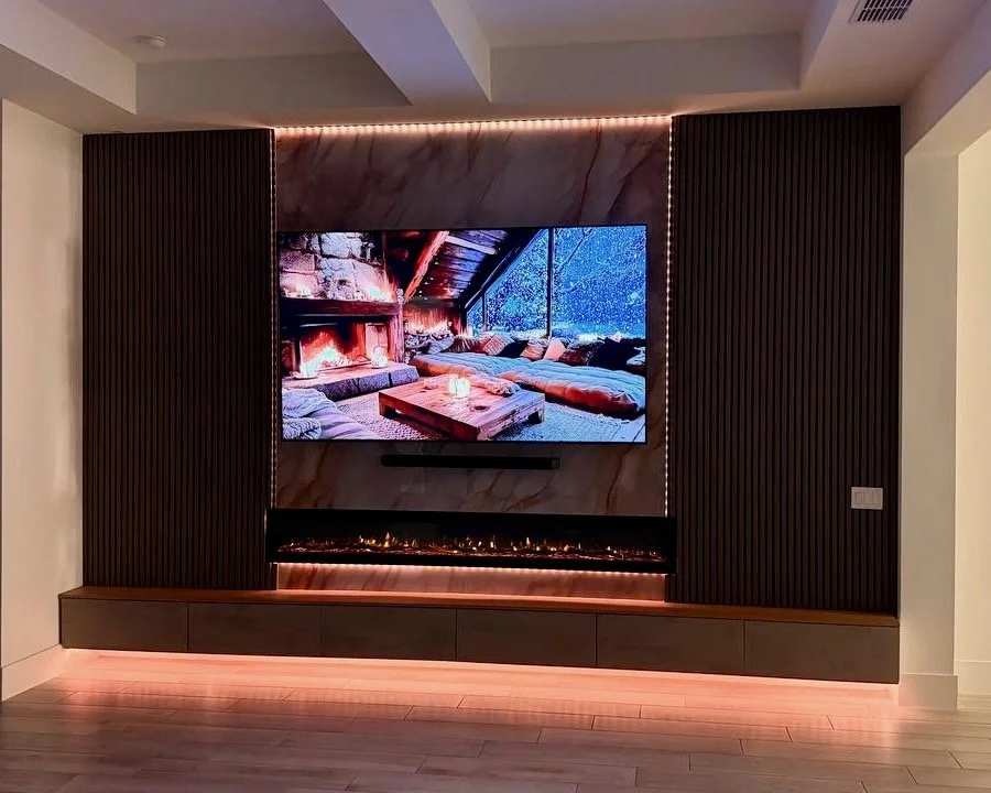 Modern Slat TV Media Wall with Fireplace and Floating Cabinetry in Englewood, Florida