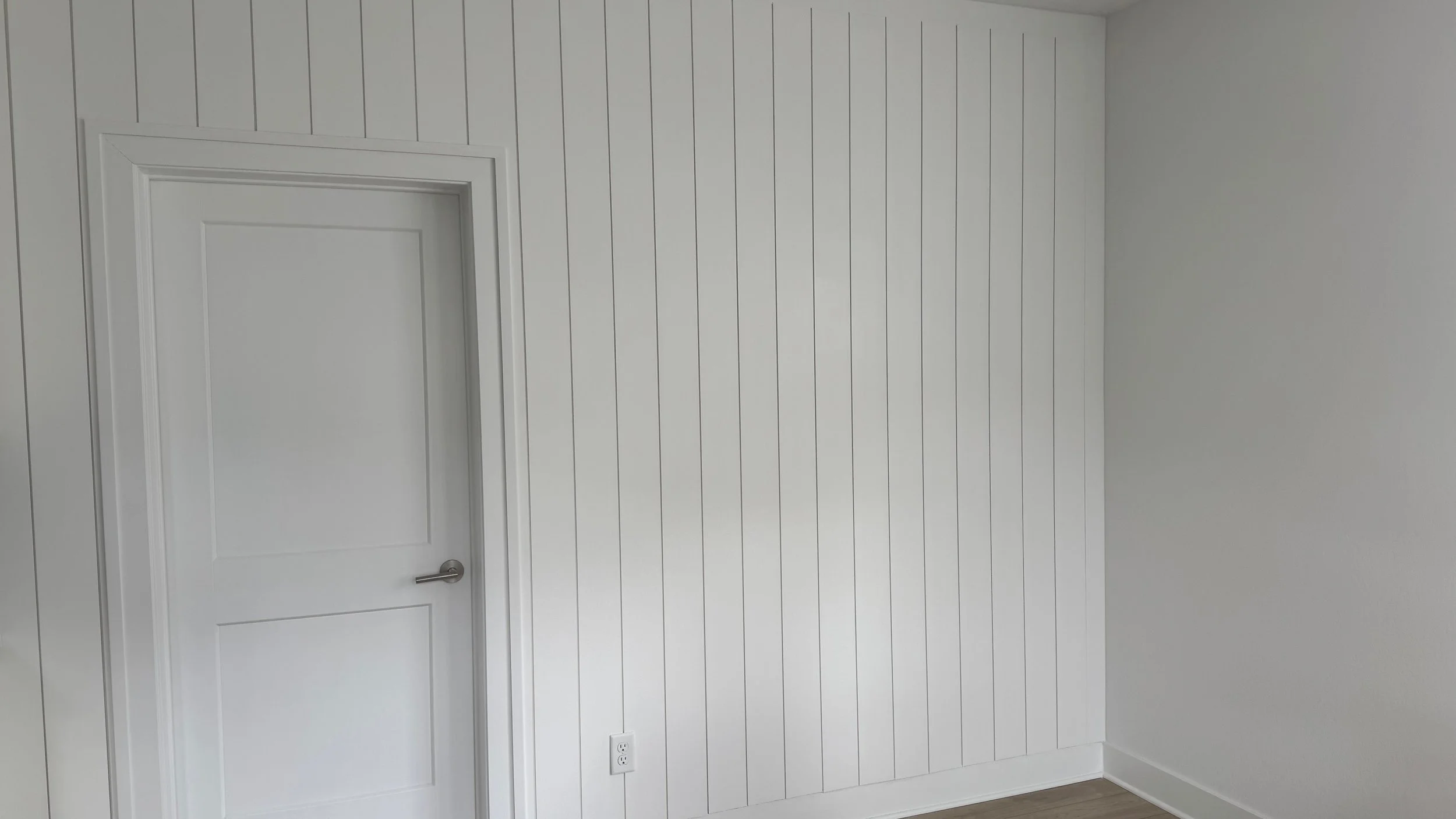 vertical shiplap panels with smooth painted finish