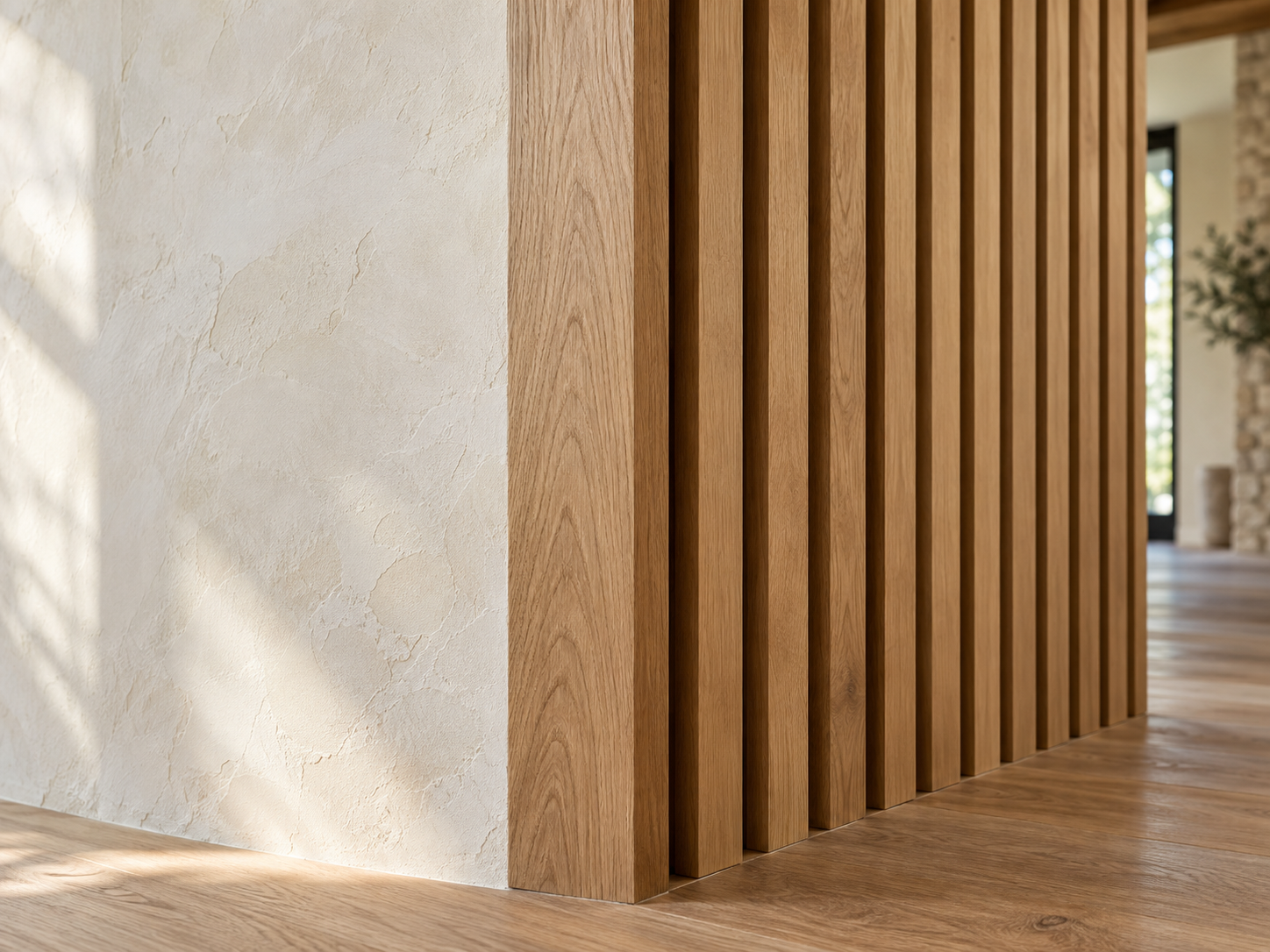 Close-up of a wooden slatted room divider with a stone wall and window in the background.