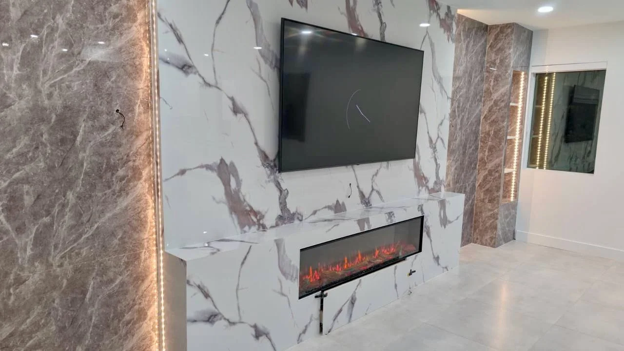 Luxury Marble Media &amp; Fireplace Wall with LED Columns – Miami, Florida