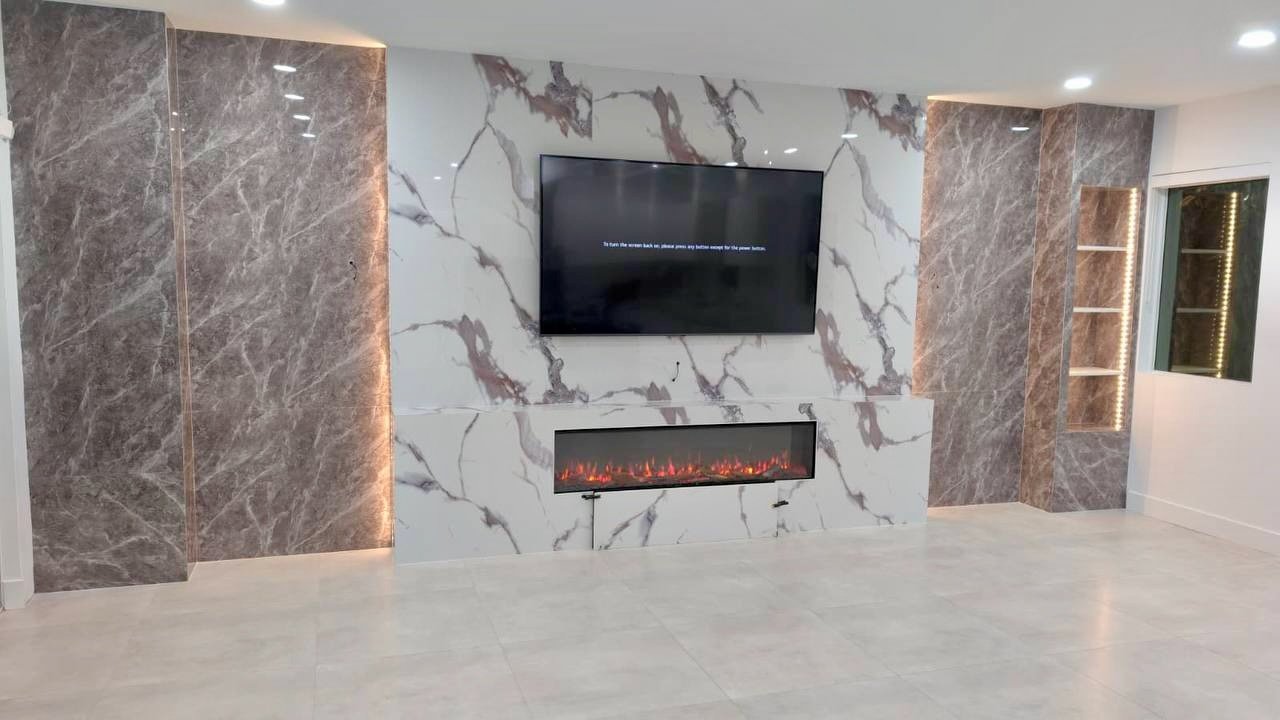 modern media wall with LED-lit columns and niche shelving