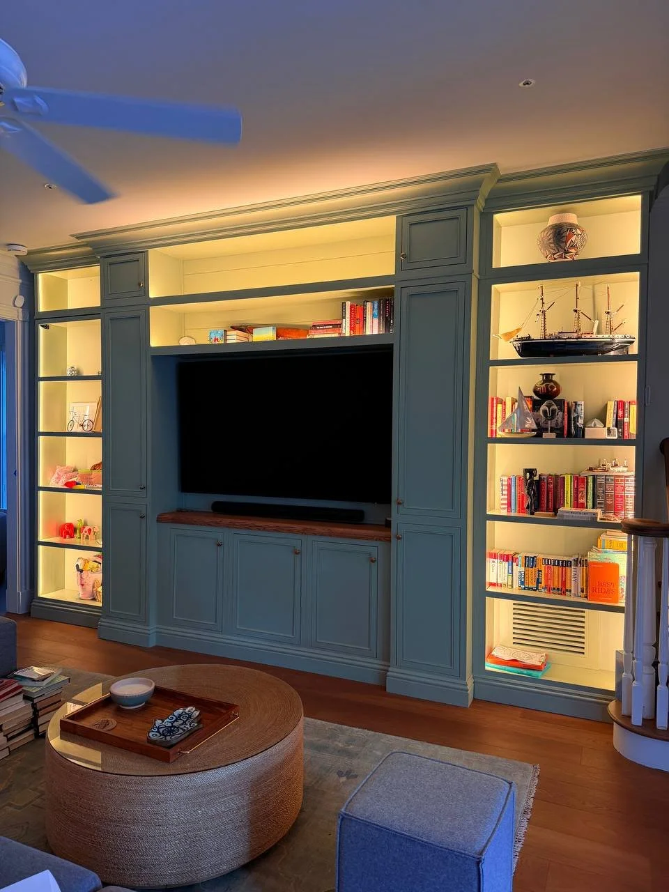 Custom Built-In Media Wall Upgrade with Continuous LED Shelf Lighting in Orlando, Florida