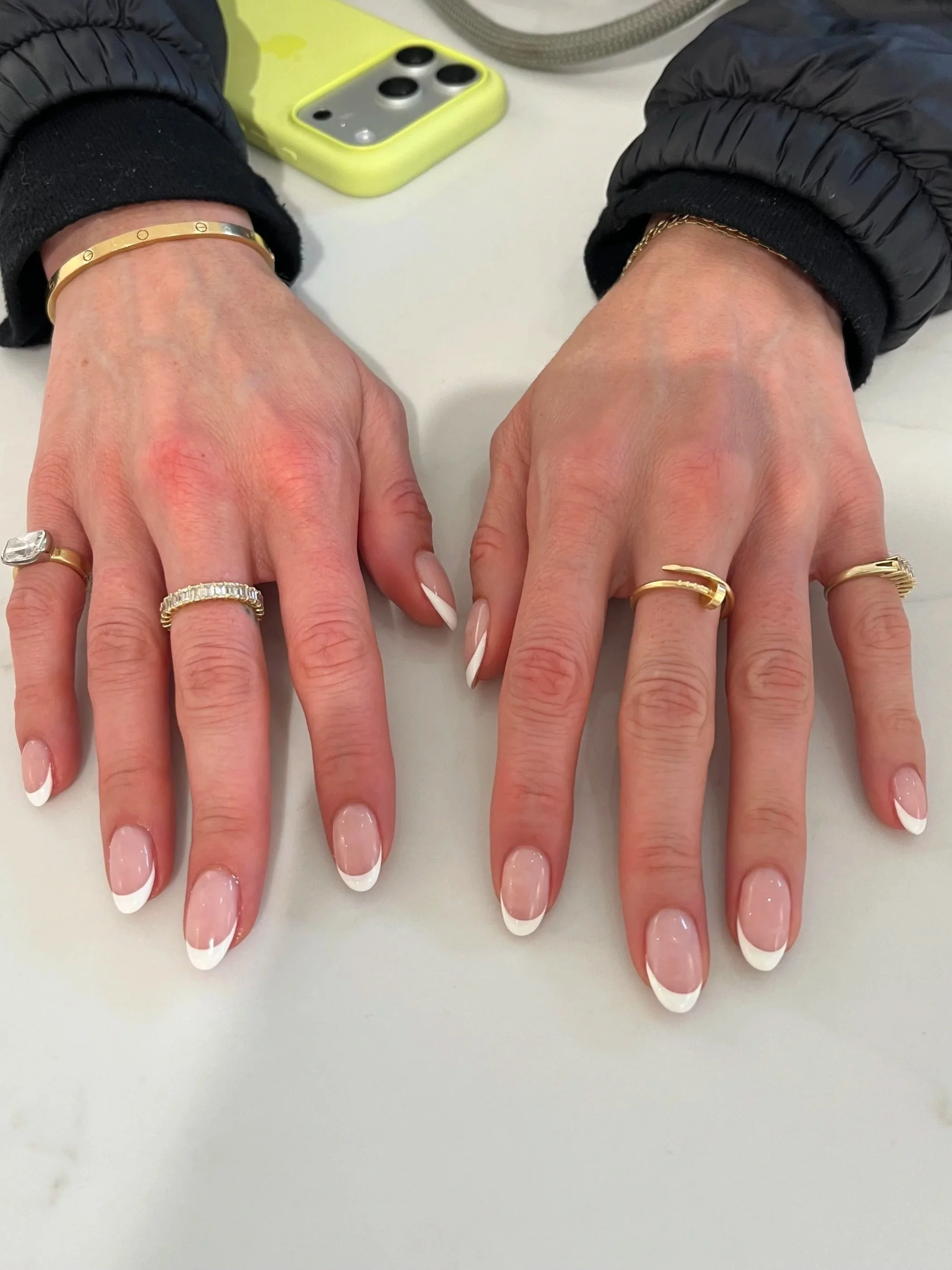 Dazzle Dry manicure with a French tip. Instead of using one universal pink base for our French manicures, we have a variety of "natural colors" to choose from. You can pick a base that best suits you. 