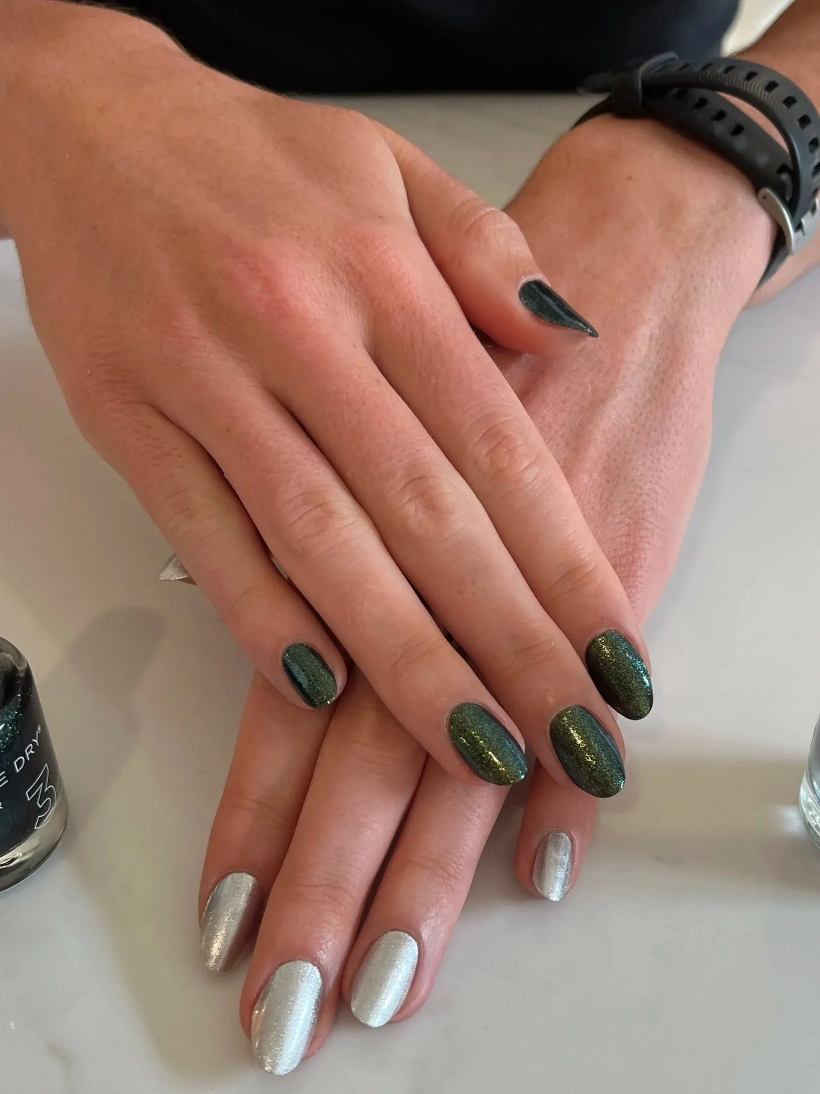 Dazzle Dry polish, featuring a sparkly dark green and silver polish