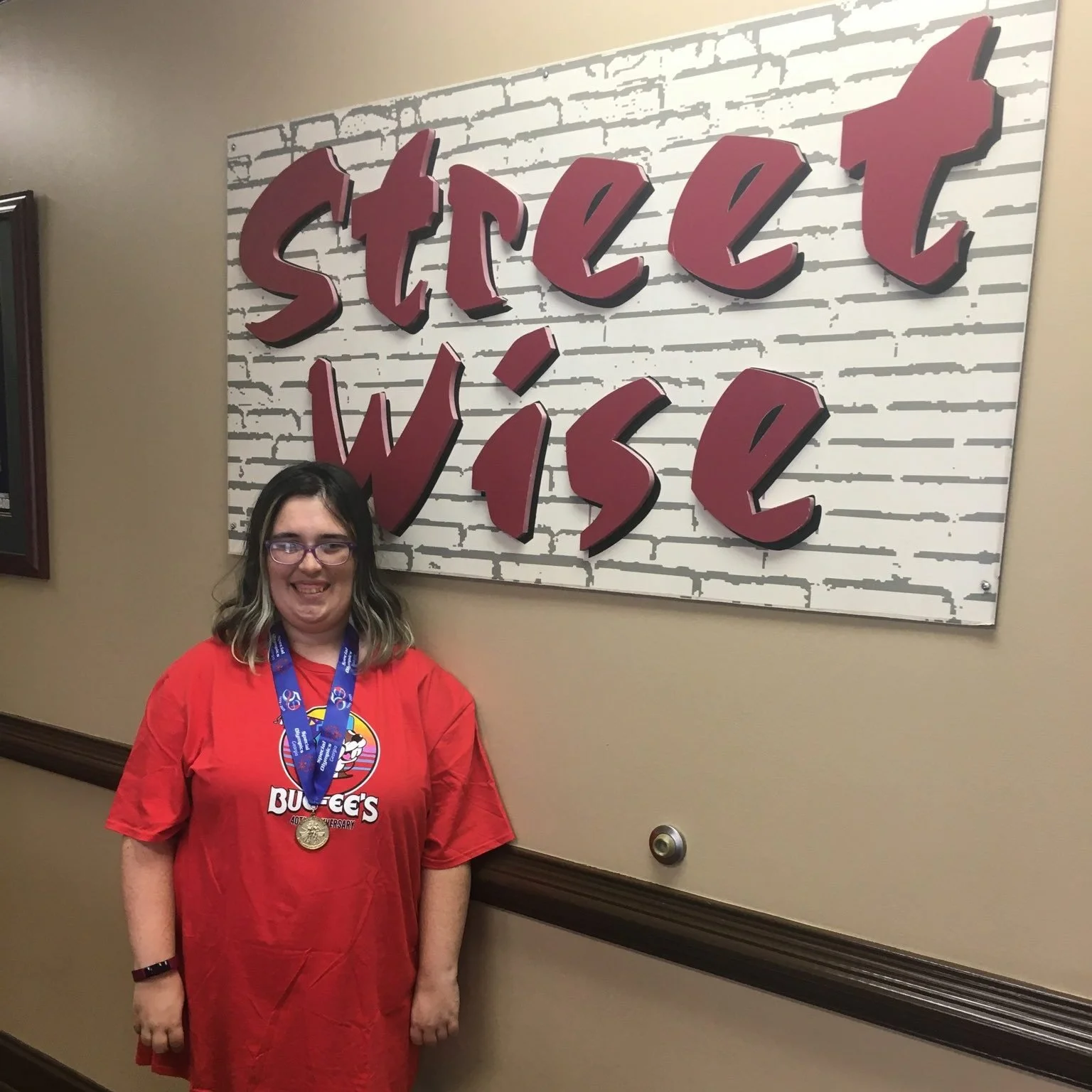 Athlete gives time to help those in need