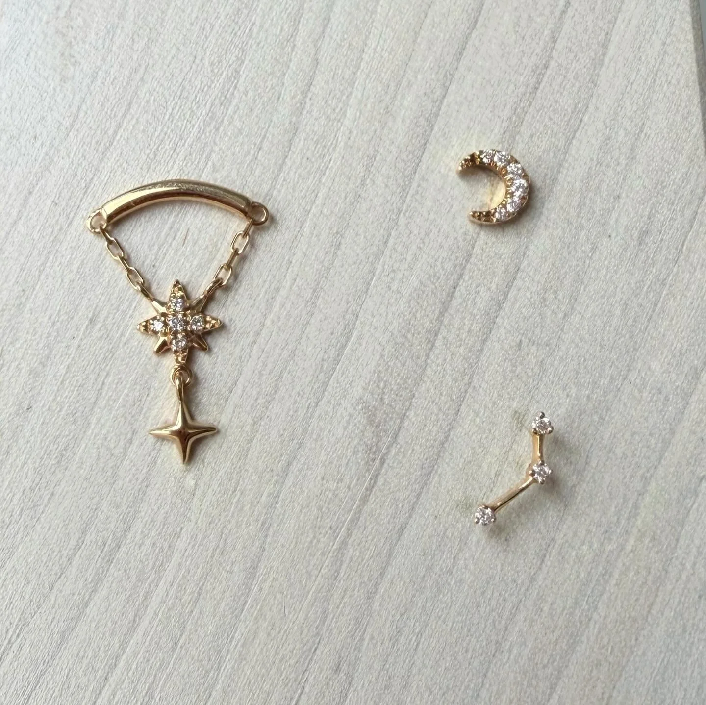 A few of the yellow gold and genuine diamond designs we have available from Modern Mood! They would look amazing together as a celestial themed curation. 💫