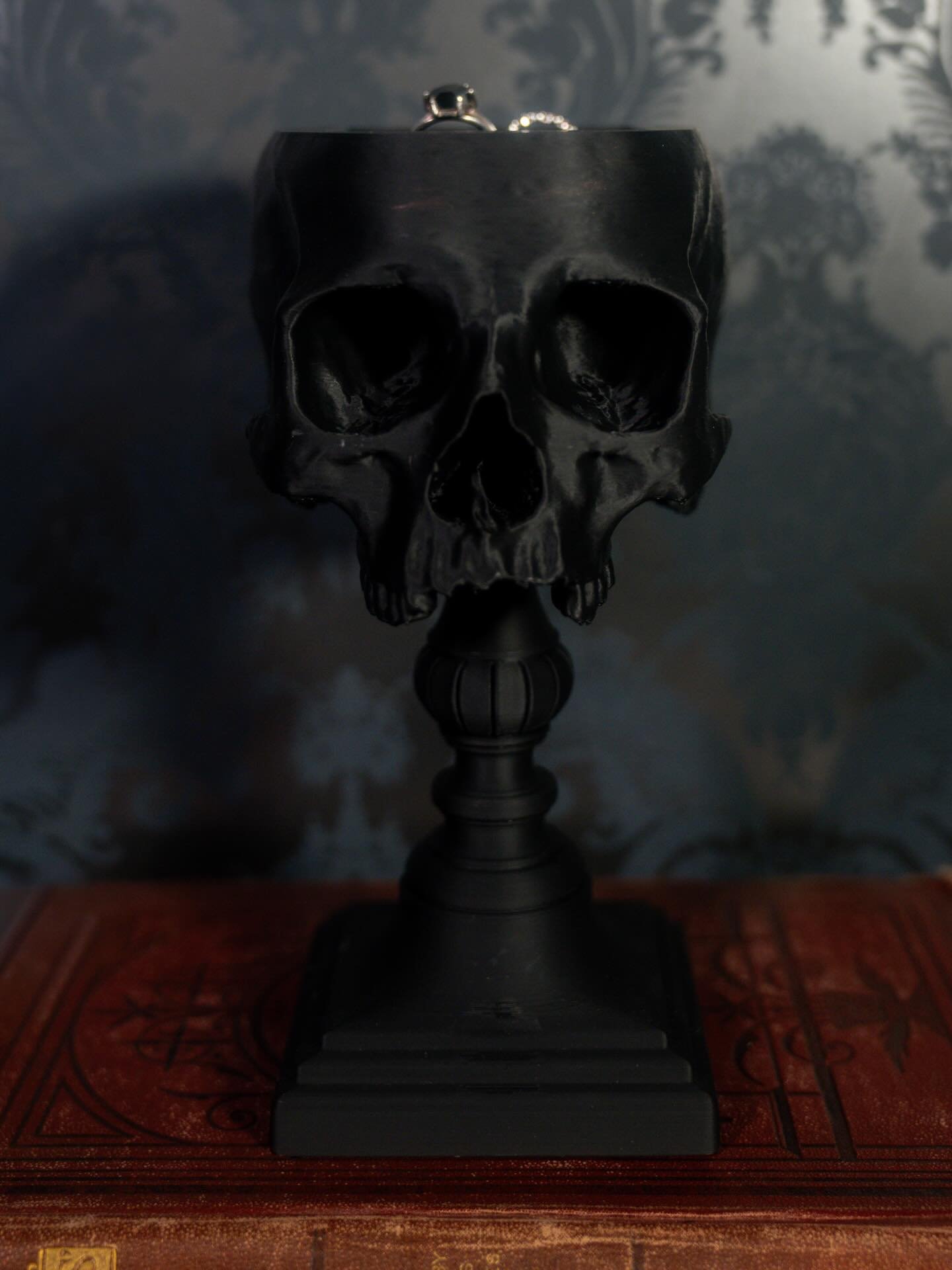 Even in stillness, love remains.

Gravebound Promise 🪦

Created for rings that carry eternity.

🖤 Now available for your bone daddy or corpse bride on Etsy &amp; our website.

#gothicdecor #gothhome #darkromance #gothicromance #graveboundpromise #r