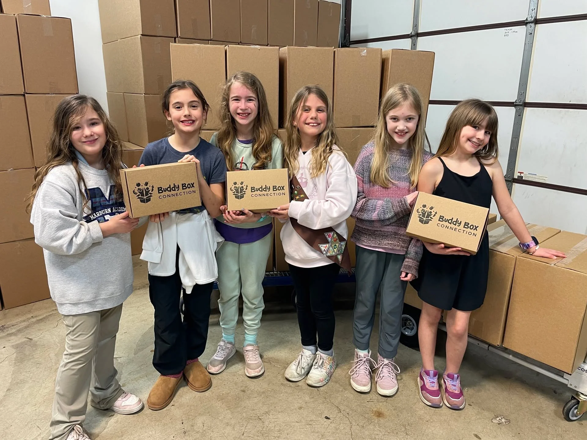 Last night we welcomed a fun group of Worthington 3rd graders from Brownie Troop #6911! 
These amazing girls learned all about our program and jumped right in to make a difference&mdash;packing 270 Buddy Boxes! 
We love seeing young leaders in action