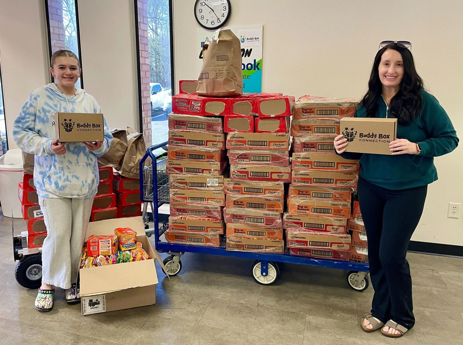 No ramen order needed this month!
Kelli Richards chose to celebrate her birthday by asking friends and family to donate ramen for our Buddy Boxes--and wow did they show up!
She and her daughter Reagan delivered an incredible 2,624 individual packs to