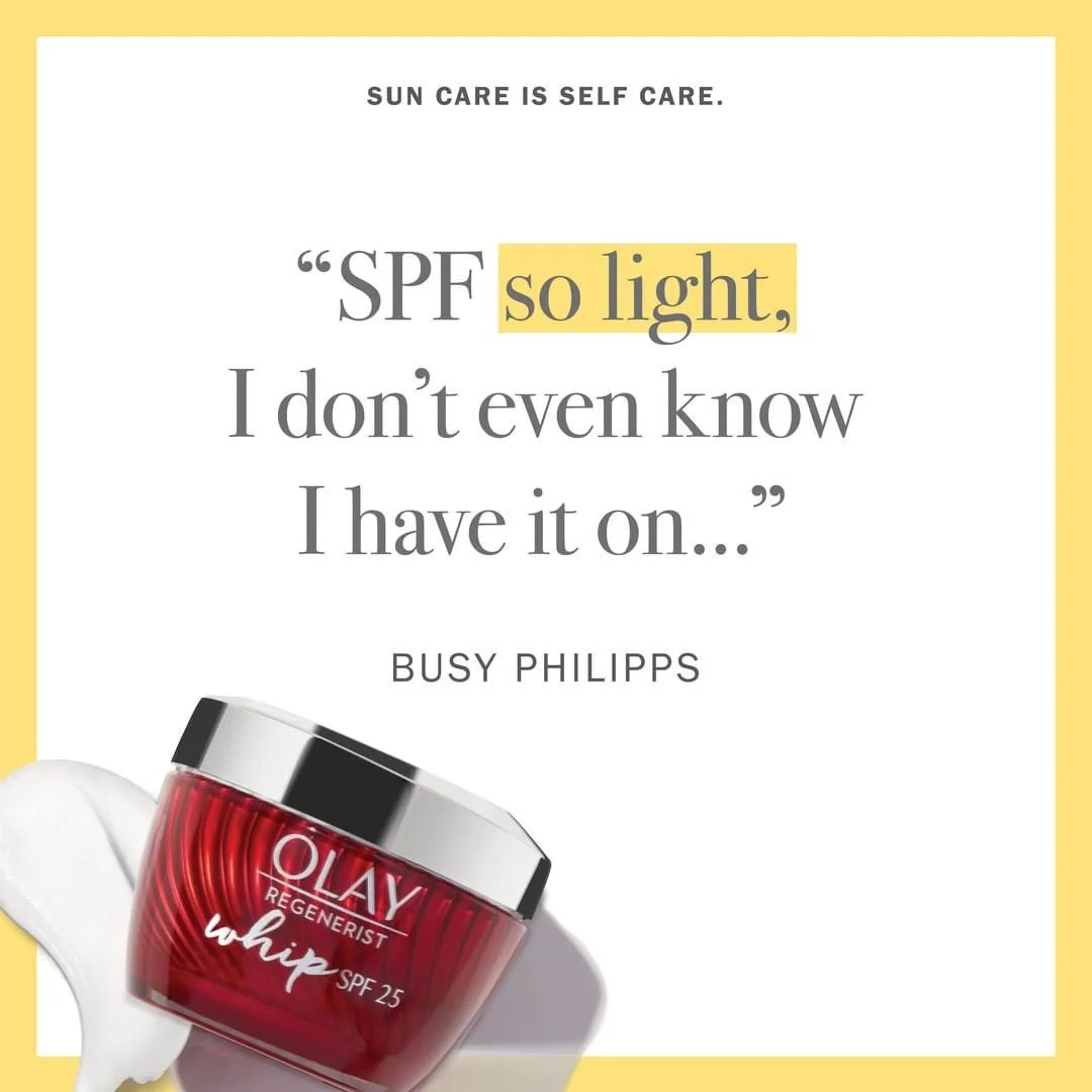 A promotional message for sunscreen with a quote from Busy Philipps about SPF being so light that she forgets she has it on, featuring an Olay Regenerist Whip SPF 25 jar and a dollop of white cream.