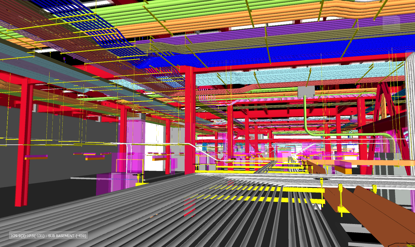 3D model of a building's sub-basement showing colorful structural steel beams, pipes, and electrical conduits.
