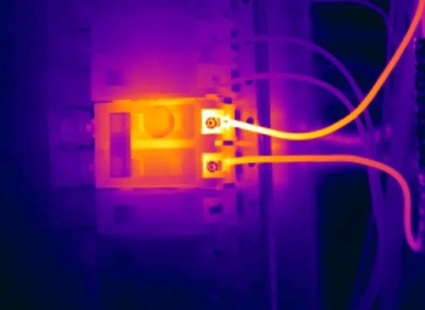 Infrared image of electrical wires connected to a circuit board.