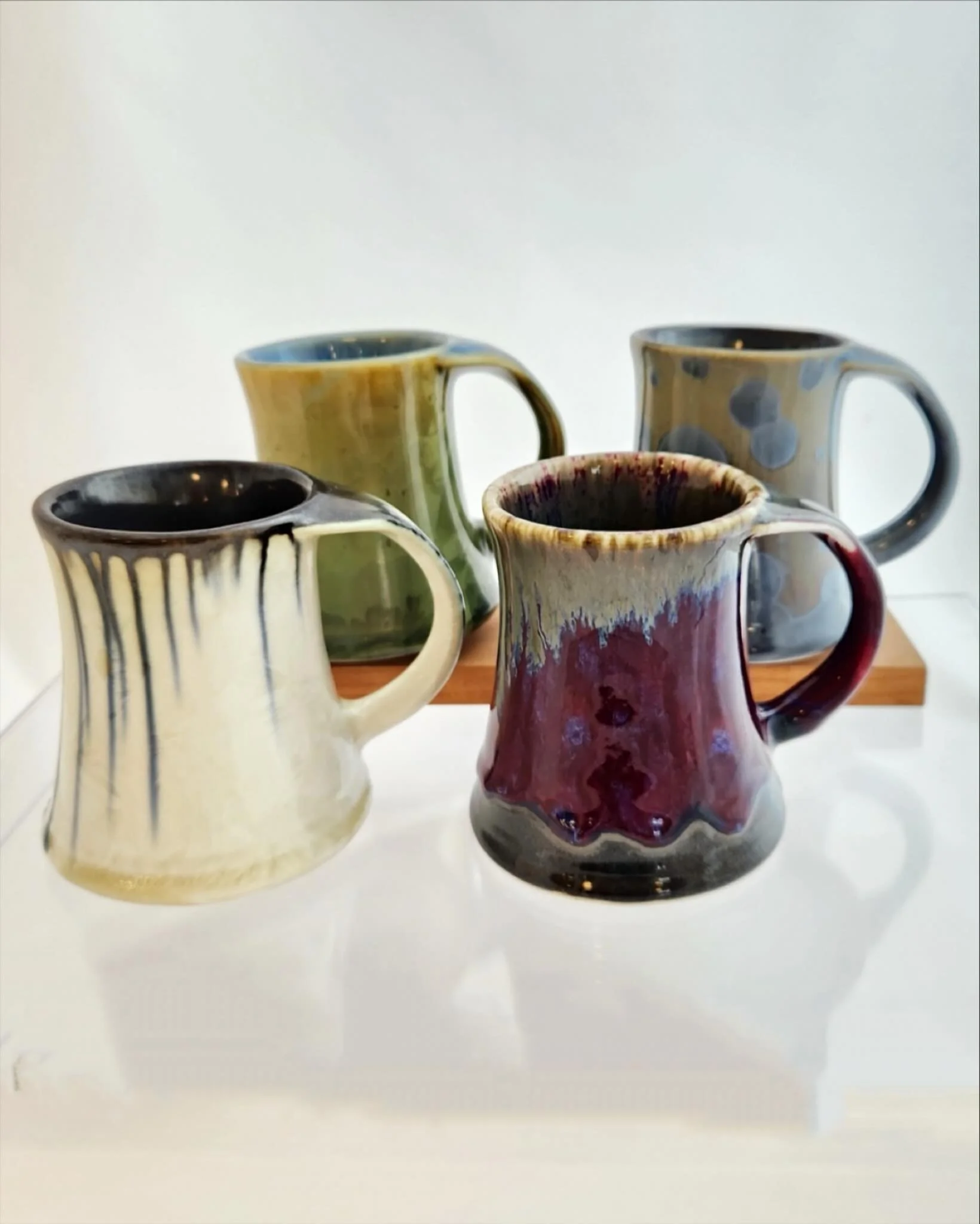 Masterfully handmade ceramics featured at Good As New Shop: A collection of beautiful Whale&rsquo;s Tail mugs from Edgecomb Pottery are waiting to grace their new home.  #shopsecondhand #edgecombpottery #whalestail #goodasnewshopsherborn