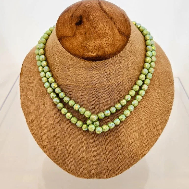 Vintage aurora borealis beauty! This necklace is just gorgeous in an unusual mint green - just in time for spring! Visit Good As New Shop's "Treasure Room" that features an array of jewelry and extra special items. #shopsecondhand #goodasne