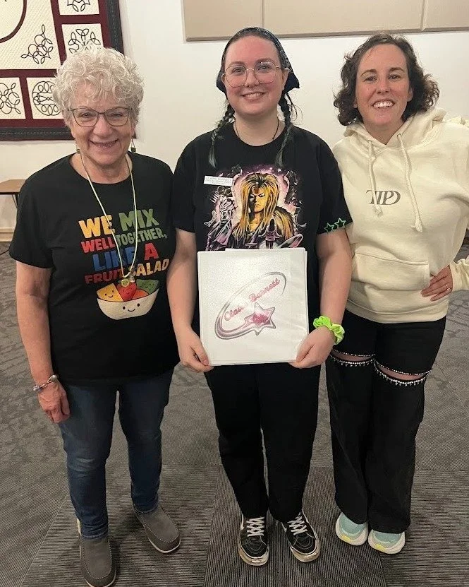 CHC is thrilled to introduce our newest Lead, Claire! 

Claire has a strong musical background, from singing in middle school chorus to playing the flute through college. Their love of music was inspired by their dad, who also sings and plays guitar.