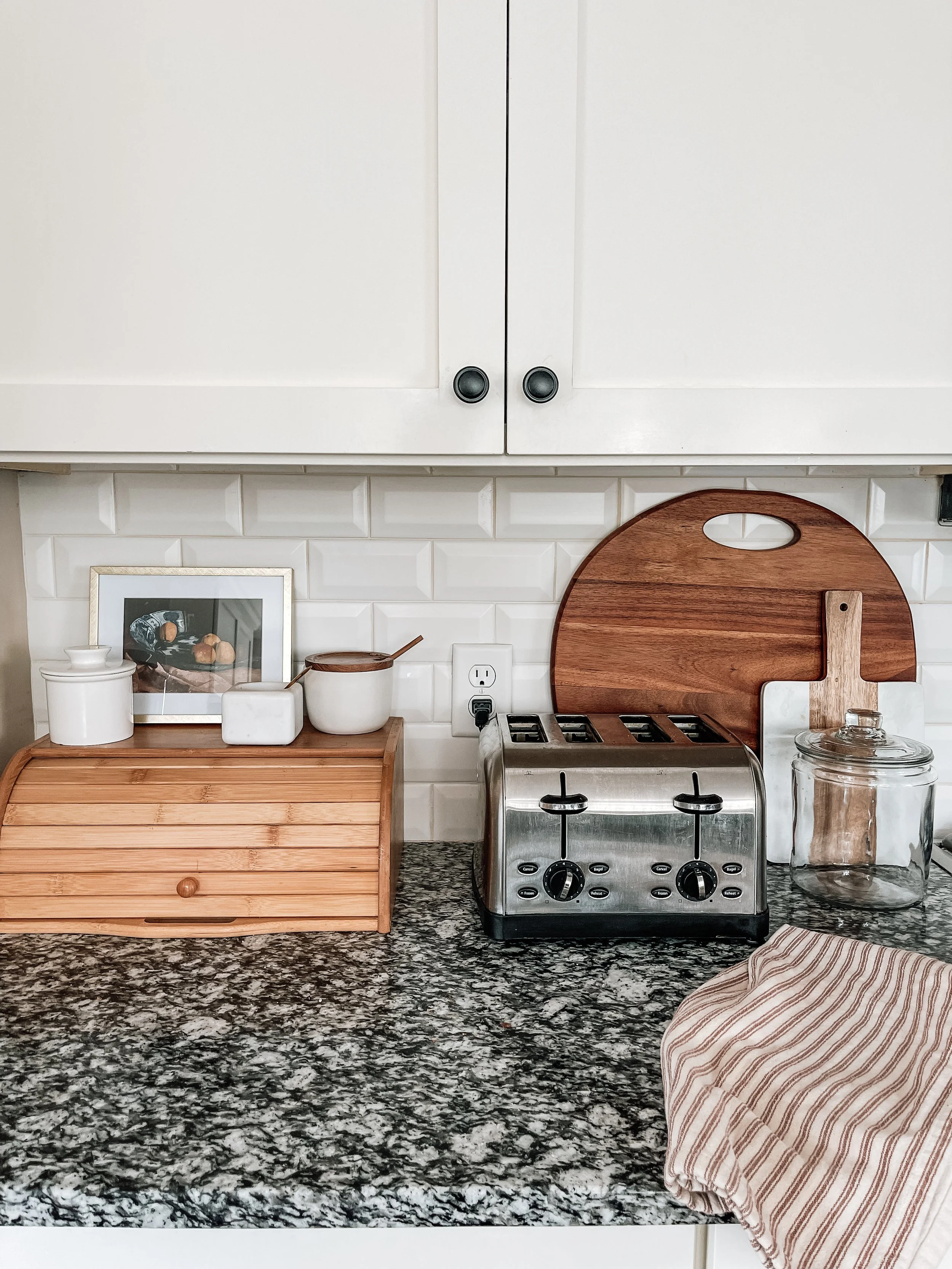 kitchen-counter-with-toaster-breadbox-salt-cellar-honeypot