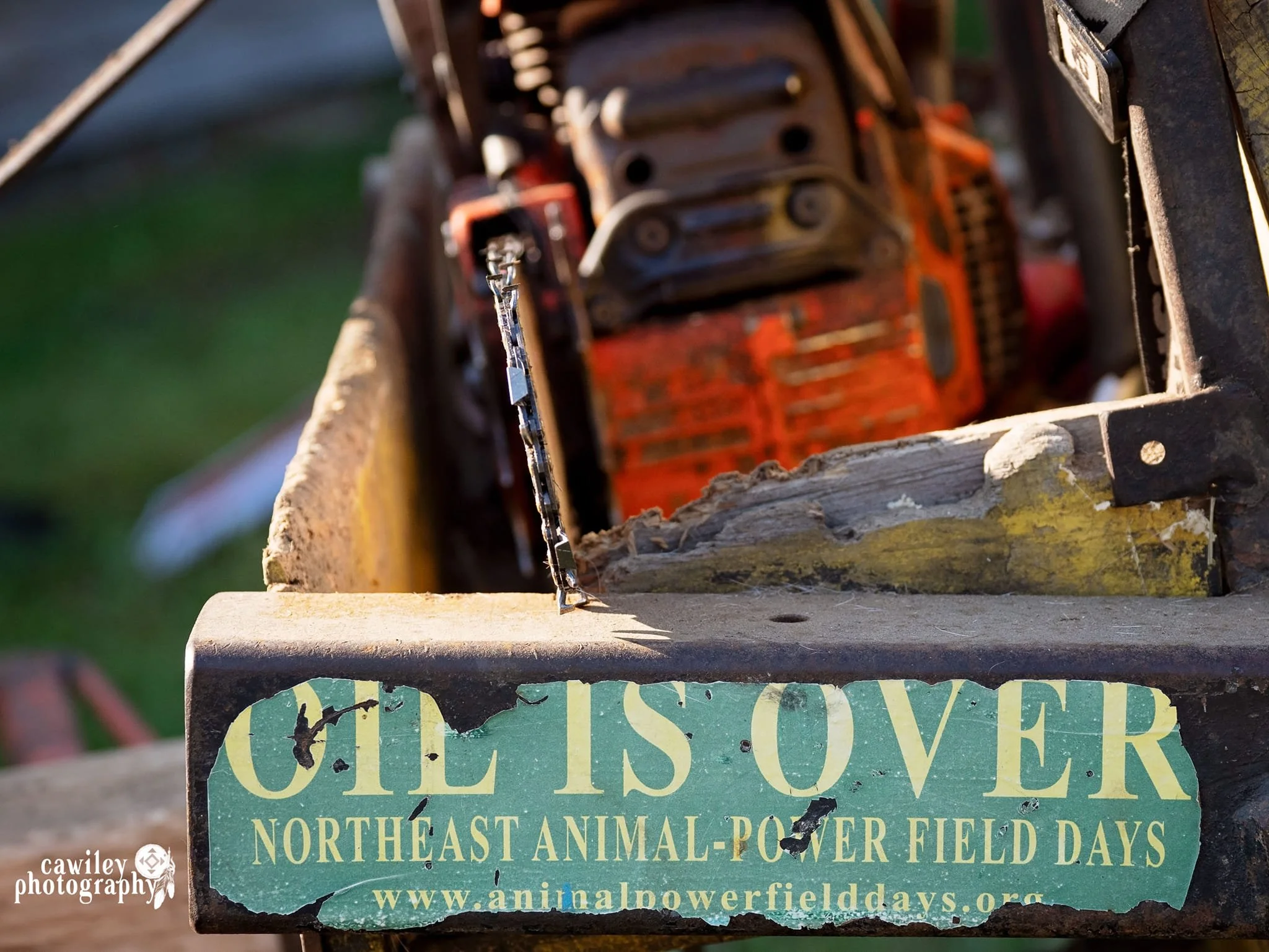 Oil is Over bumper sticker at Draft Animal Power Field Days 2023.