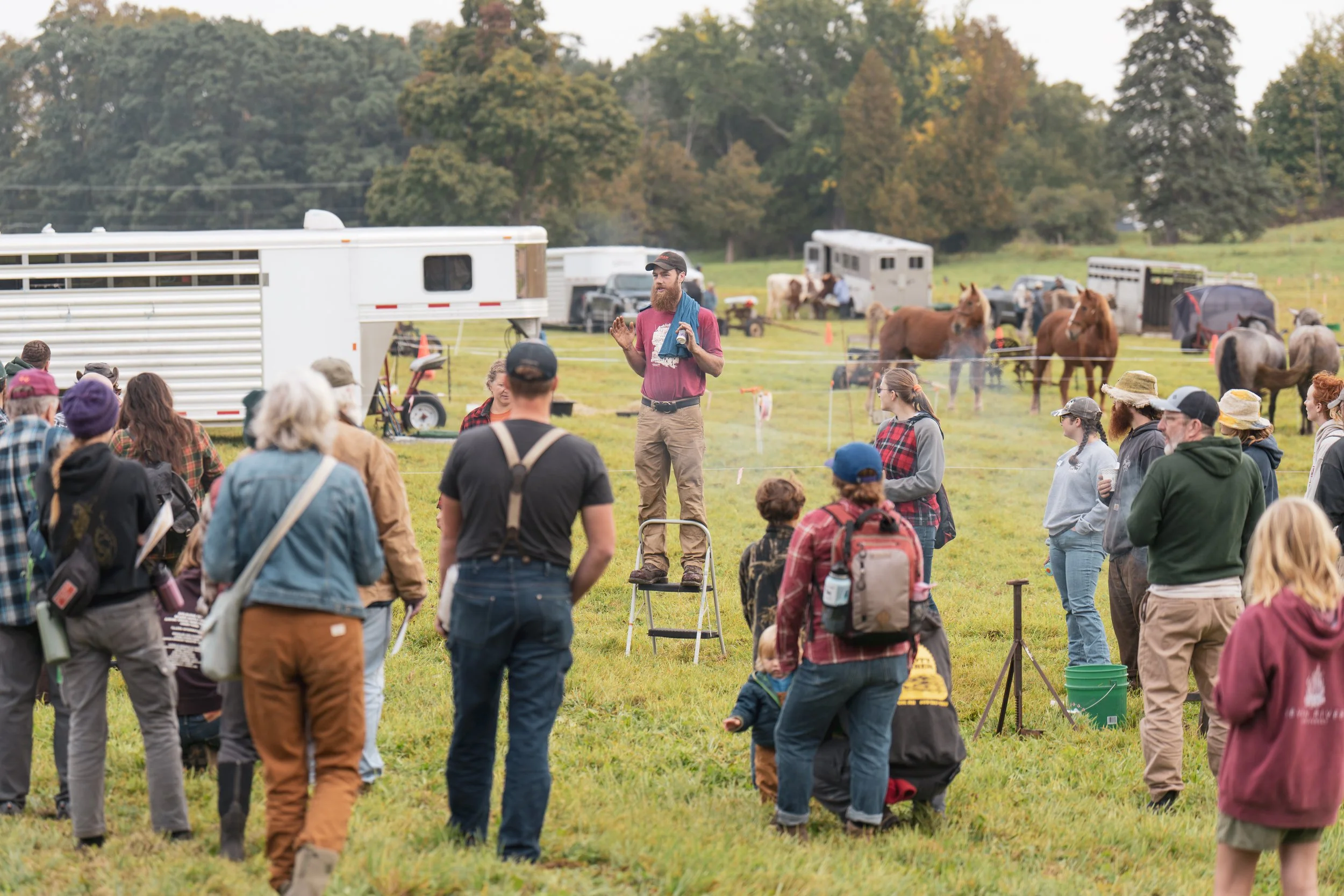 Forest worker addresses community at Draft Animal Power Field Days 2023.