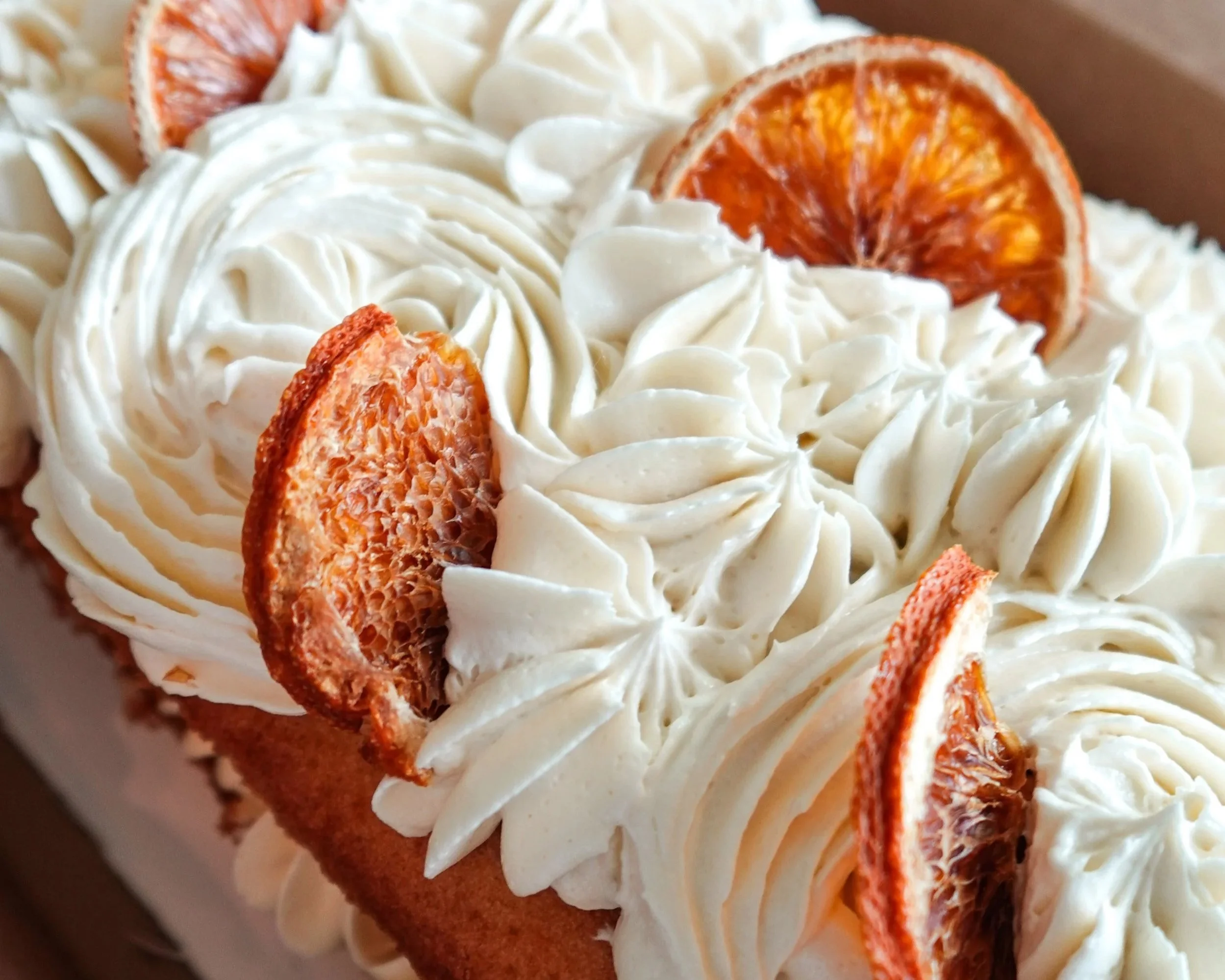 Vanilla bean loaf cake with
Orange Cream Buttercream