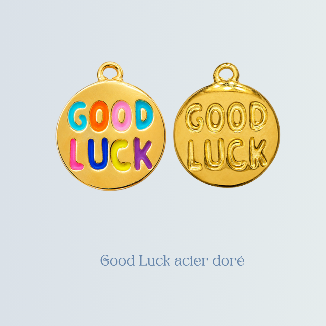 Breloque Good luck acier doré.png
