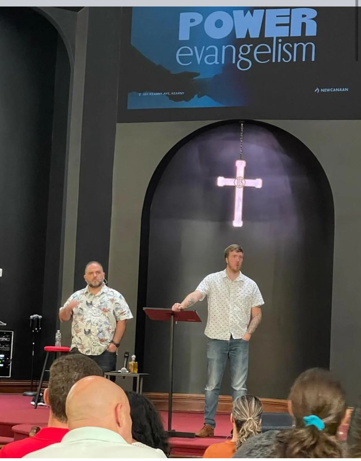 Jeremy Groves and a fellow minister teaching at a church gathering.