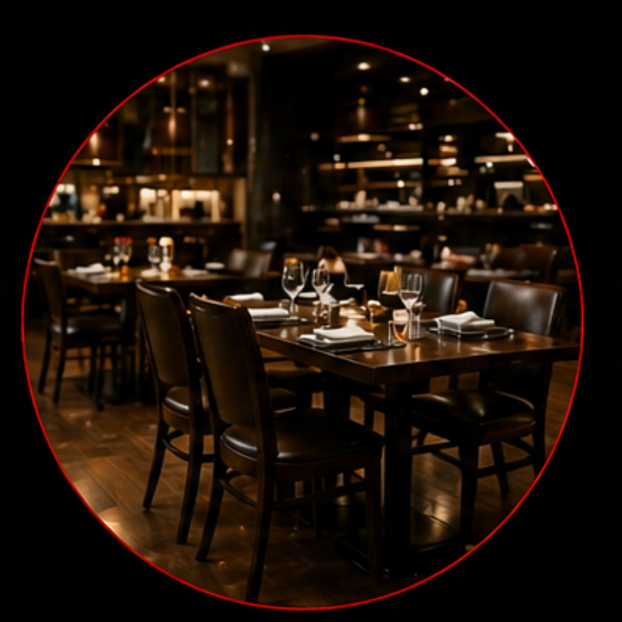 Empty restaurant dining area with tables, chairs, and place settings, seen through a circular red-tinted view.