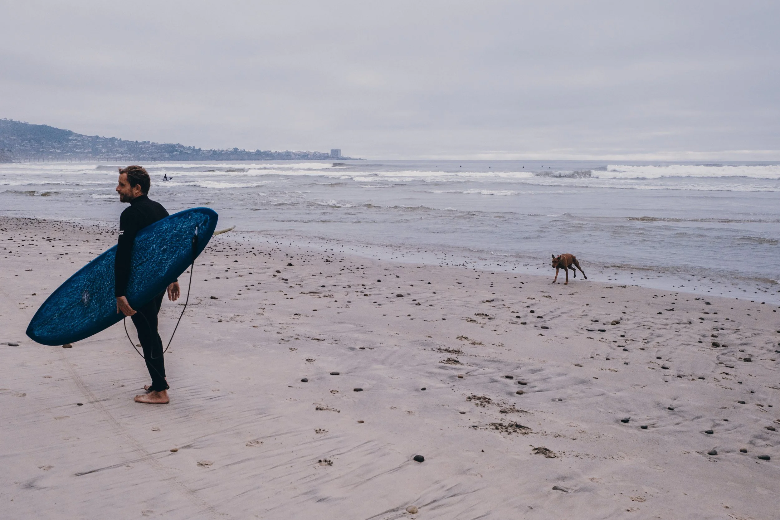  A man, his best friend, and a third wheel (not pictured). 