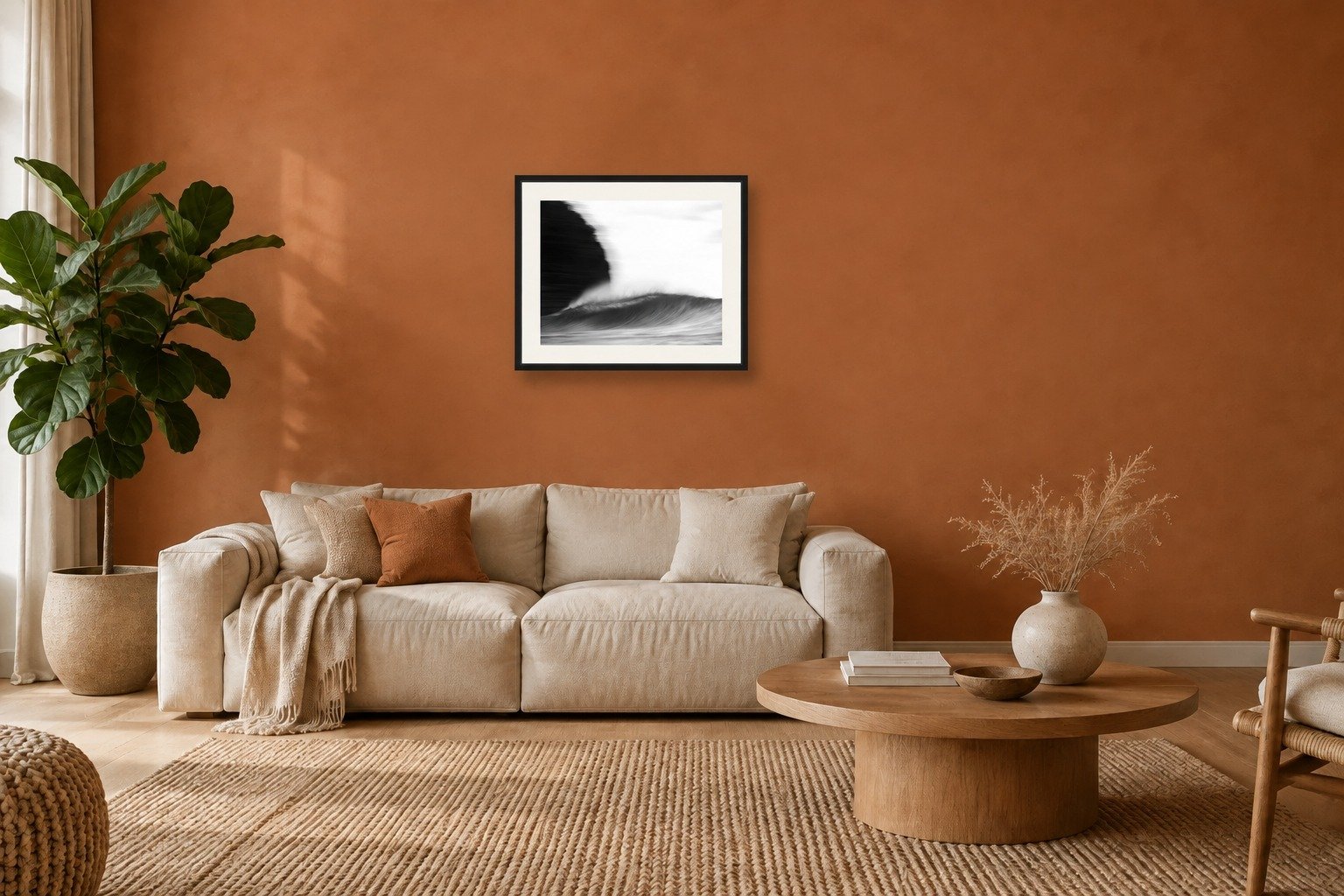 Room mockup of the Moment black and white wave print by Dom Stone framed on a living room wall