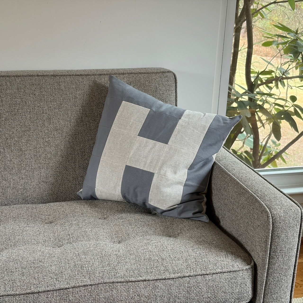There's something special about a monogram that doesn't announce itself 🤍 This new H pillow is for the Harriets, Henrys, Harpers, and Hannahs - but also for anyone who loves quiet, architectural design. Handmade patchwork in soft greys and natural l
