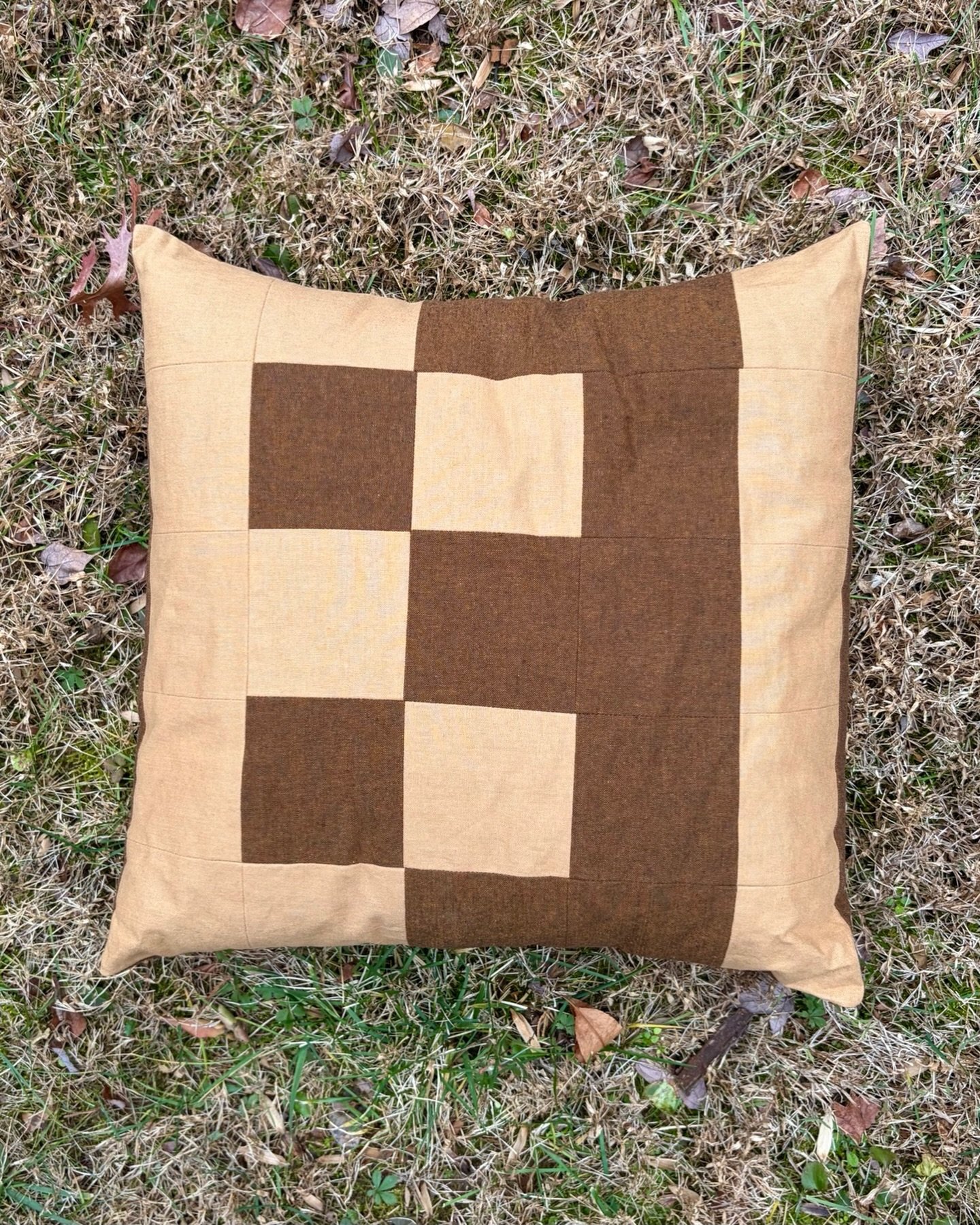 Modern patchwork: when clean lines meet handmade charm. Squint and you&rsquo;ll notice the subtle monogram, slight irregularities that come with artisan work, the way each square was cut and sewn with intention. This is was sets handmade apart from m