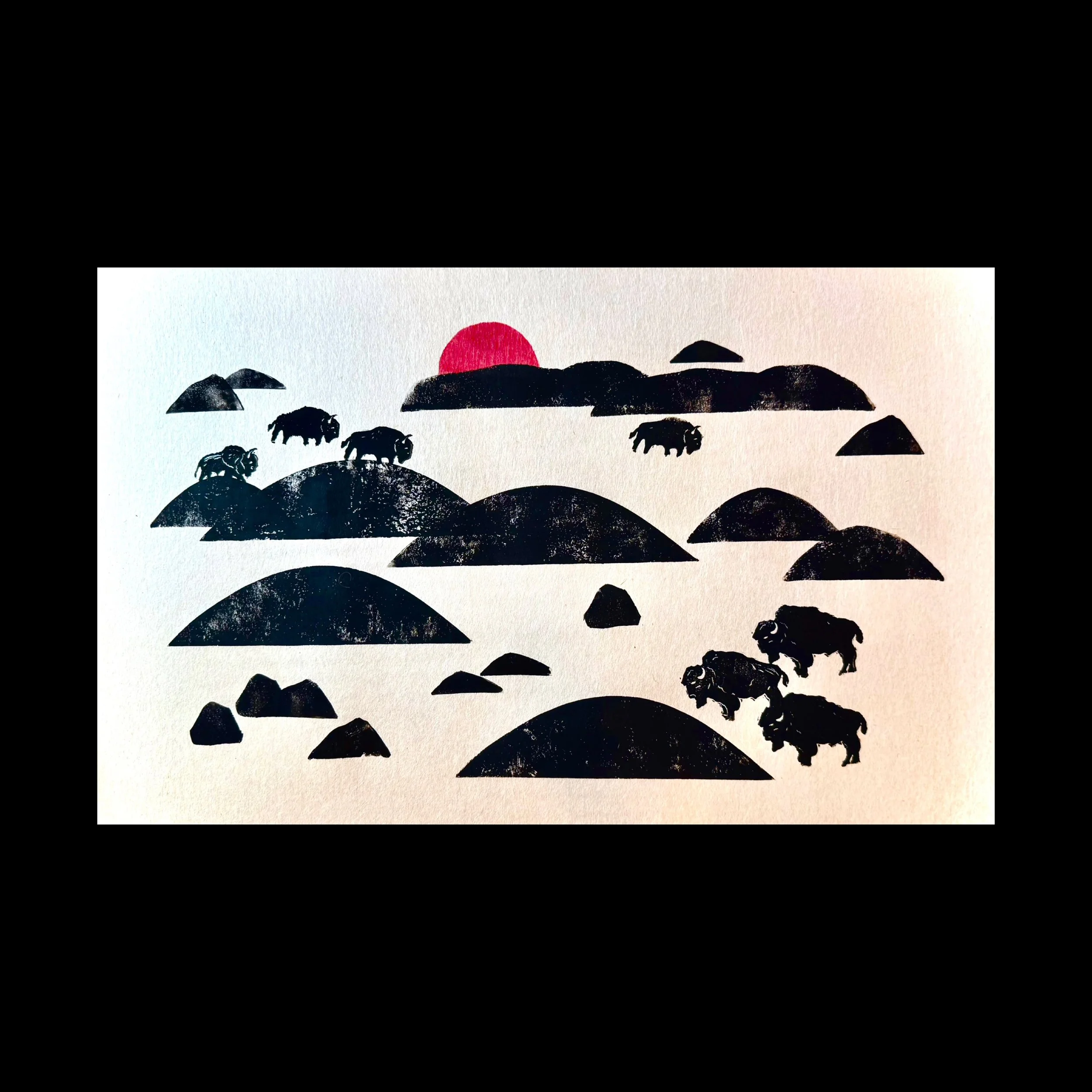 Silhouette of a landscape with hills, rocks, and elephants, with a red sun setting in the background.
