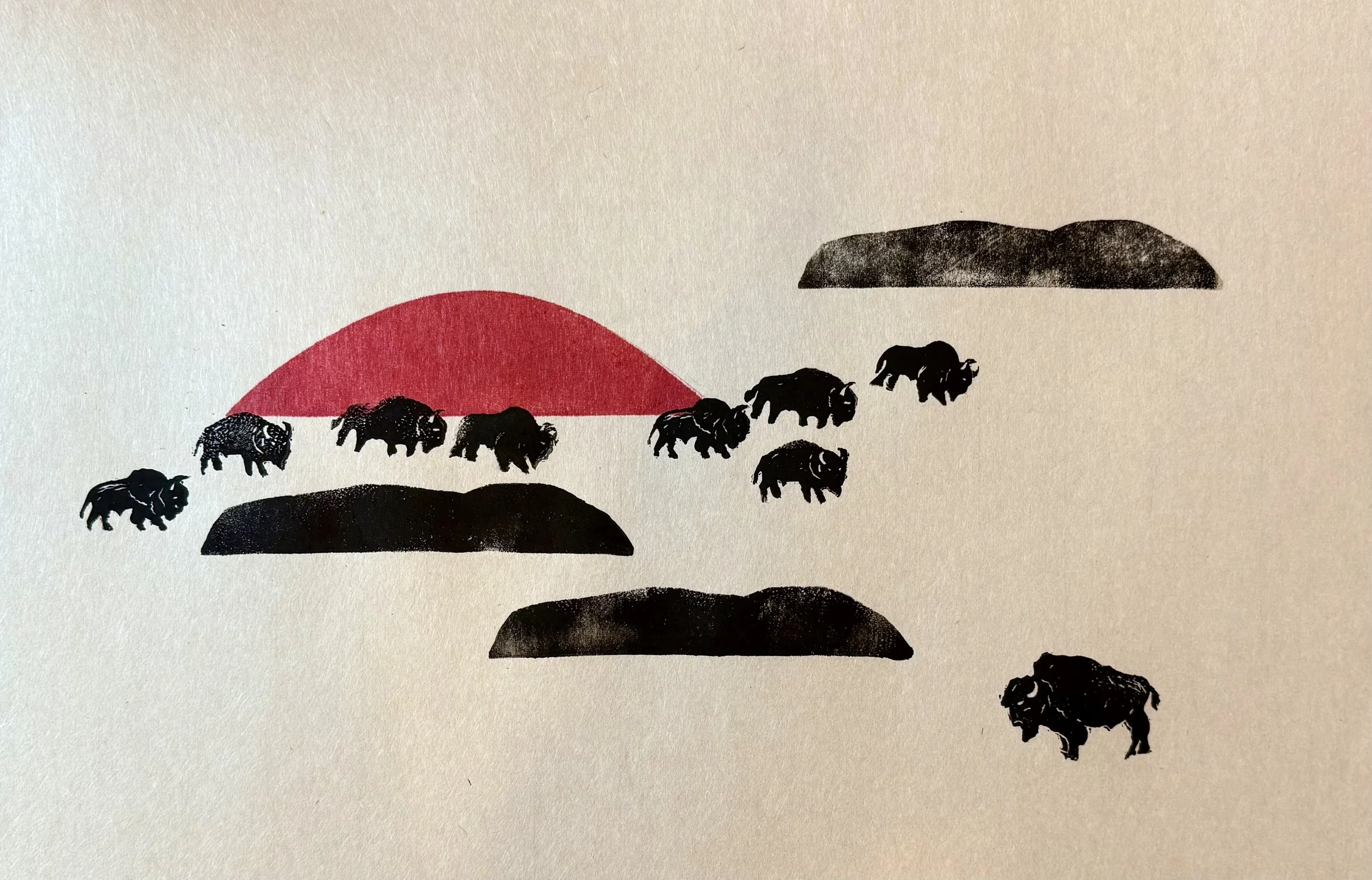 Artistic illustration of bison silhouettes with a red semi-circle sun and black land formations in the background.