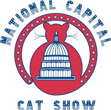 The logo of the National Capital Cat Show featuring a red, white, and blue design with a stylized Capitol building and a cat silhouette.