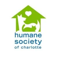 Logo of Humane Society of Charlotte with a green outline of a house, a dog, a cat, and a heart inside.