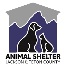 Logo for Animal Shelter Jackson and Teton County featuring a dog and a cat silhouette against mountains.