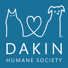 Line drawing of a cat and a dog with a heart between them, above the text 'DAKIN Humane Society' on a blue background.