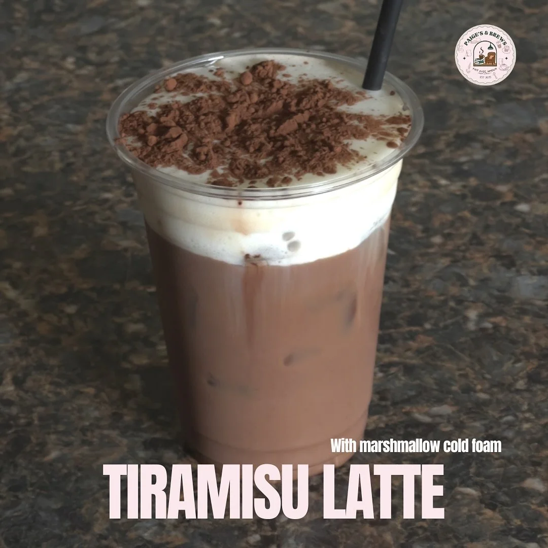 Fall dressed up in chocolate layers: tiramisu latte with marshmallow cold foam. ☕️🍂

#paigesandbrews #paigesandbrewshtx #CoffeeAndBooks #AutumnSips #CozyCafeVibes #FallInACup #CoffeeLoversClub #LatteArtLove #CafeAesthetic #BookishCafe #CozyCorners #