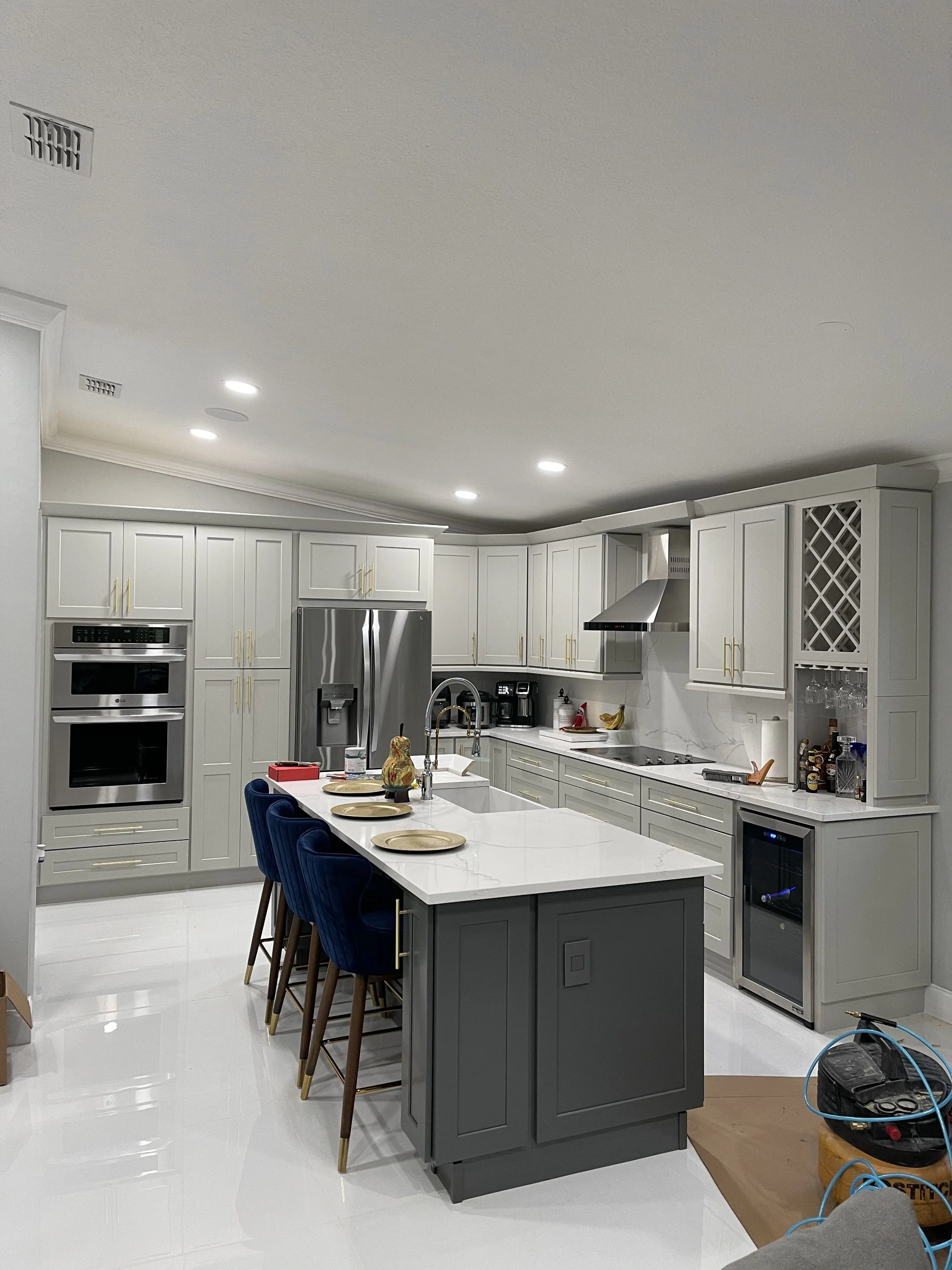 Light Gray Perimeter Cabinets With A Dark Gray Island Kitchen Remodel by EZ Cabinets & Granite project photo