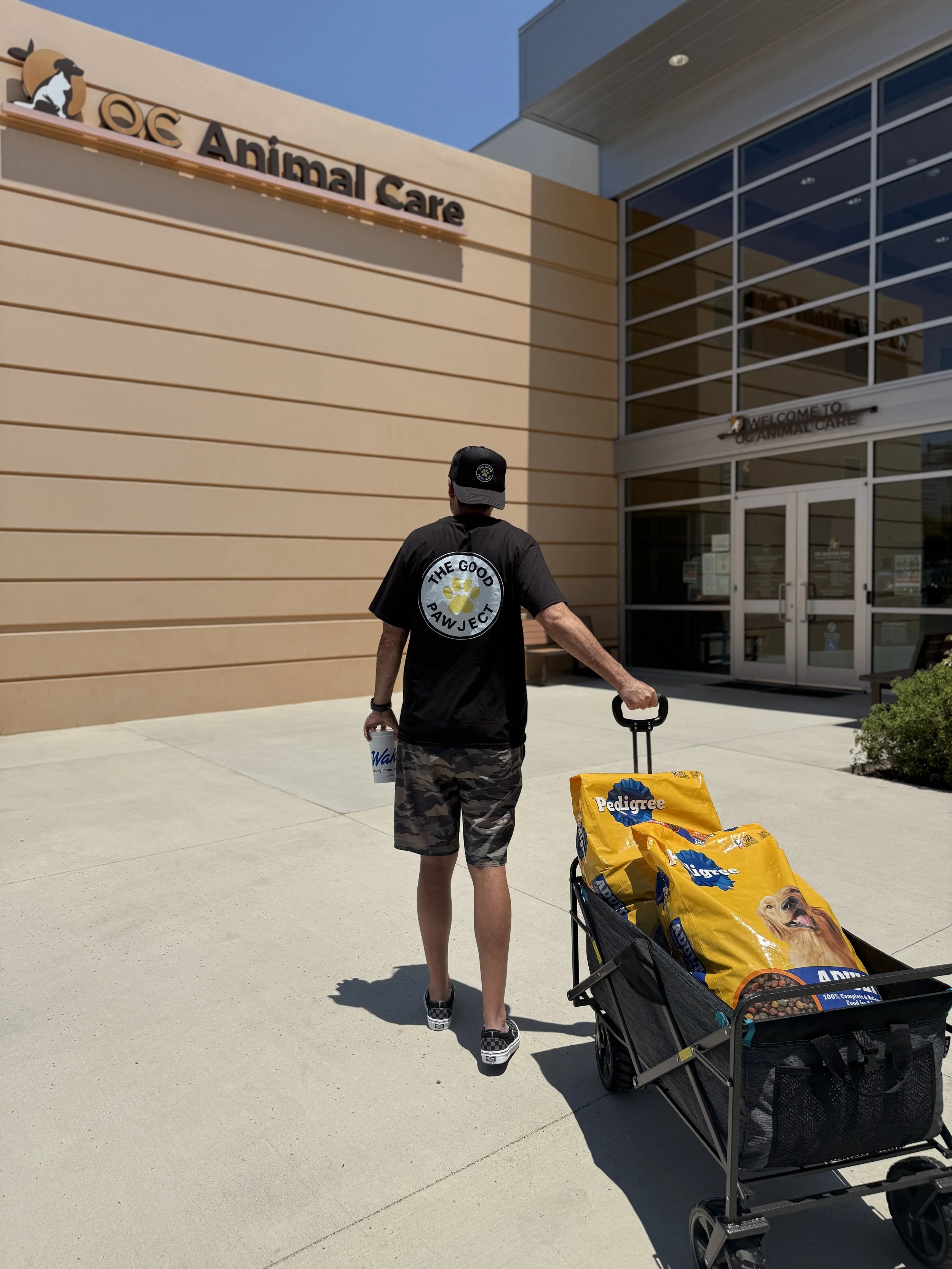 Love Drop of kindness at OC Animal Care in Orange County — The Good Pawject volunteer delivering pet food, treats, and supplies to the county animal shelter to support homeless pets and promote kindness for animals across Southern California.