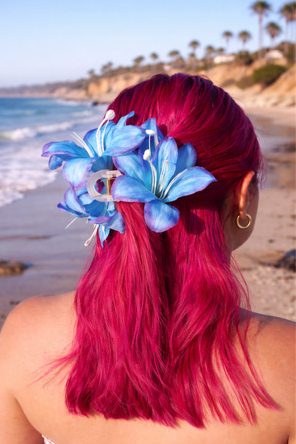 Magenta+hair+and+blue+lilies+at+sunset.png
