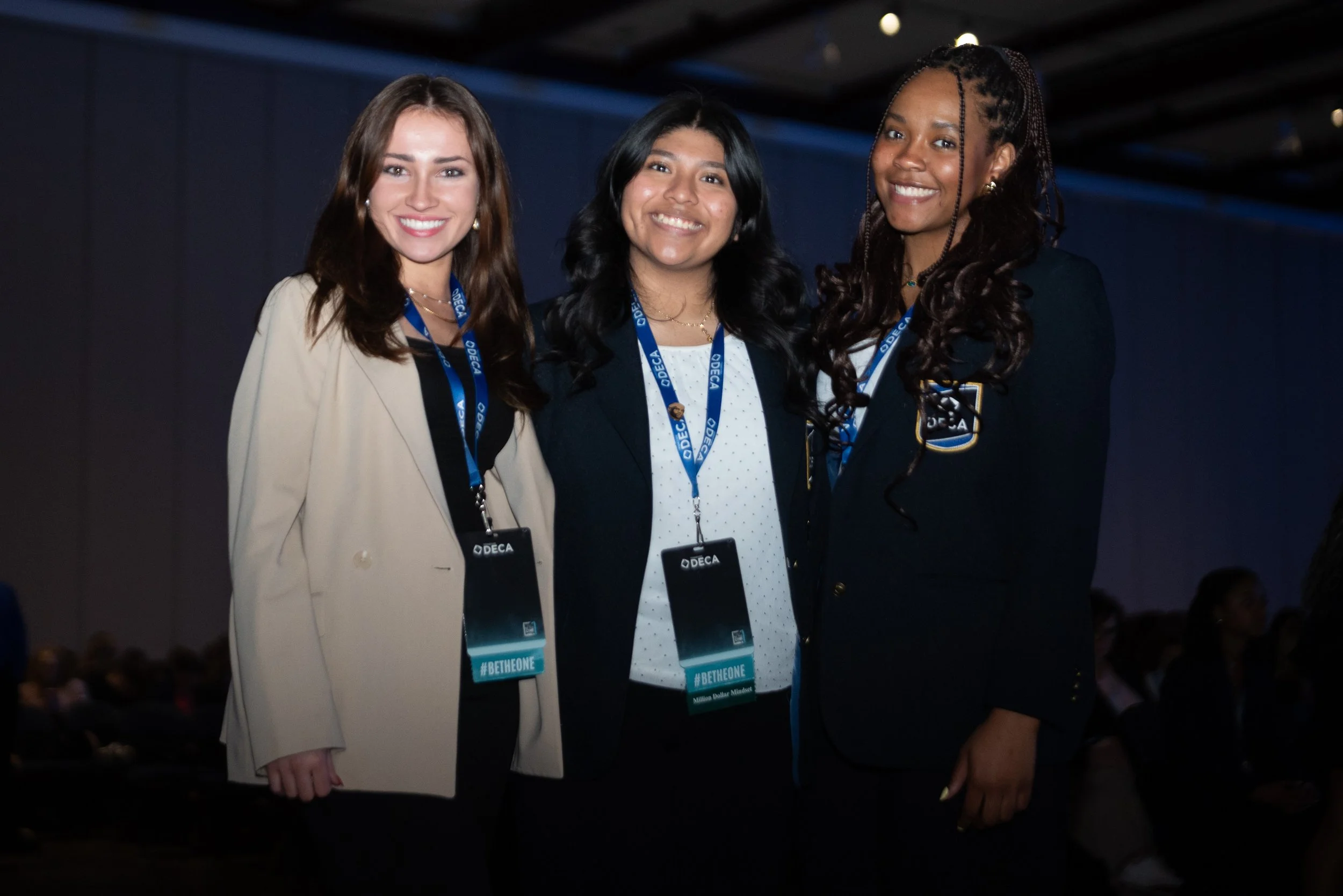 DECA members pose for a photo while attending the conference.