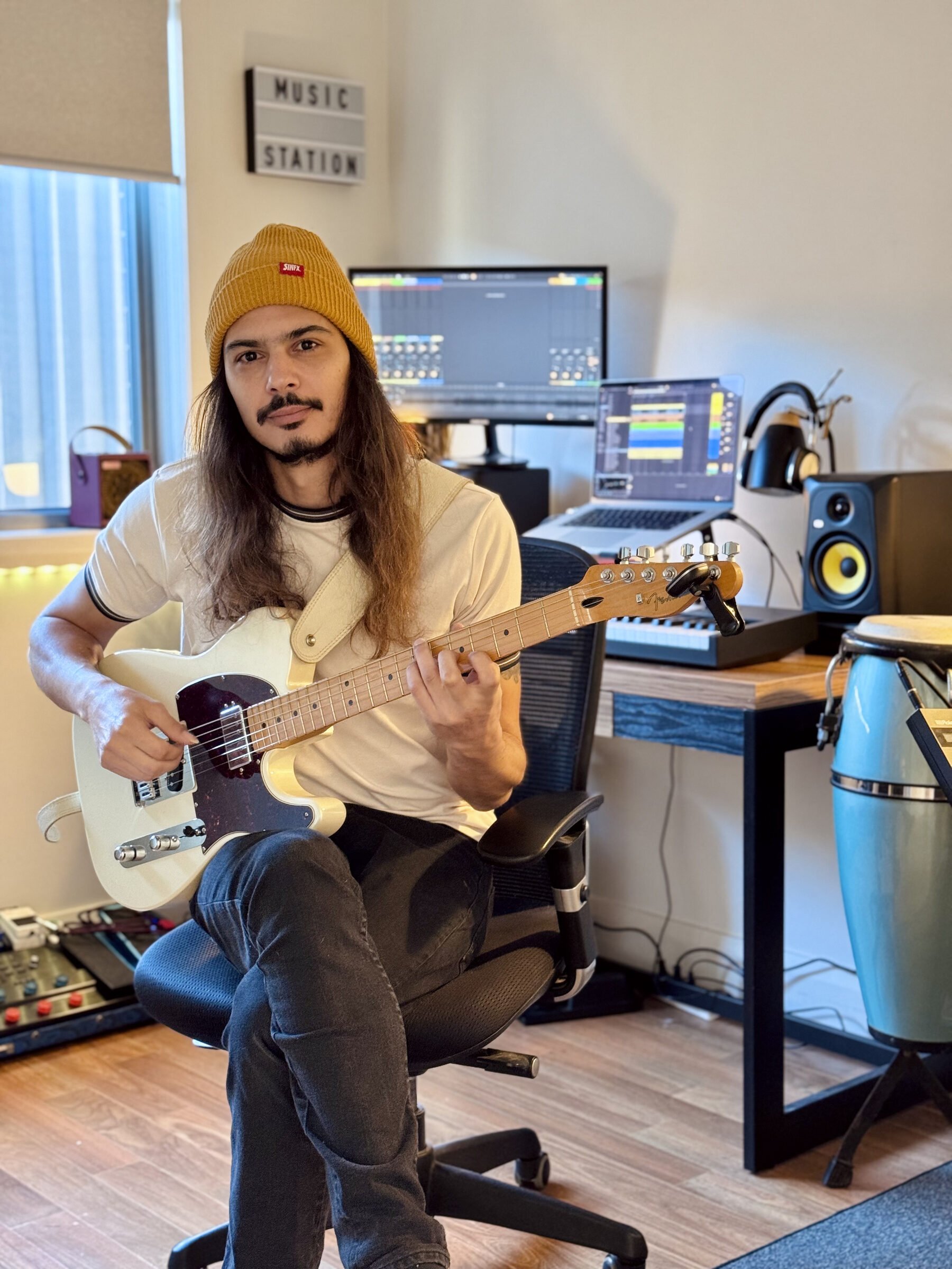 Bruno Yague, guitar teacher in Dee Why, playing electric guitar in his home music studio