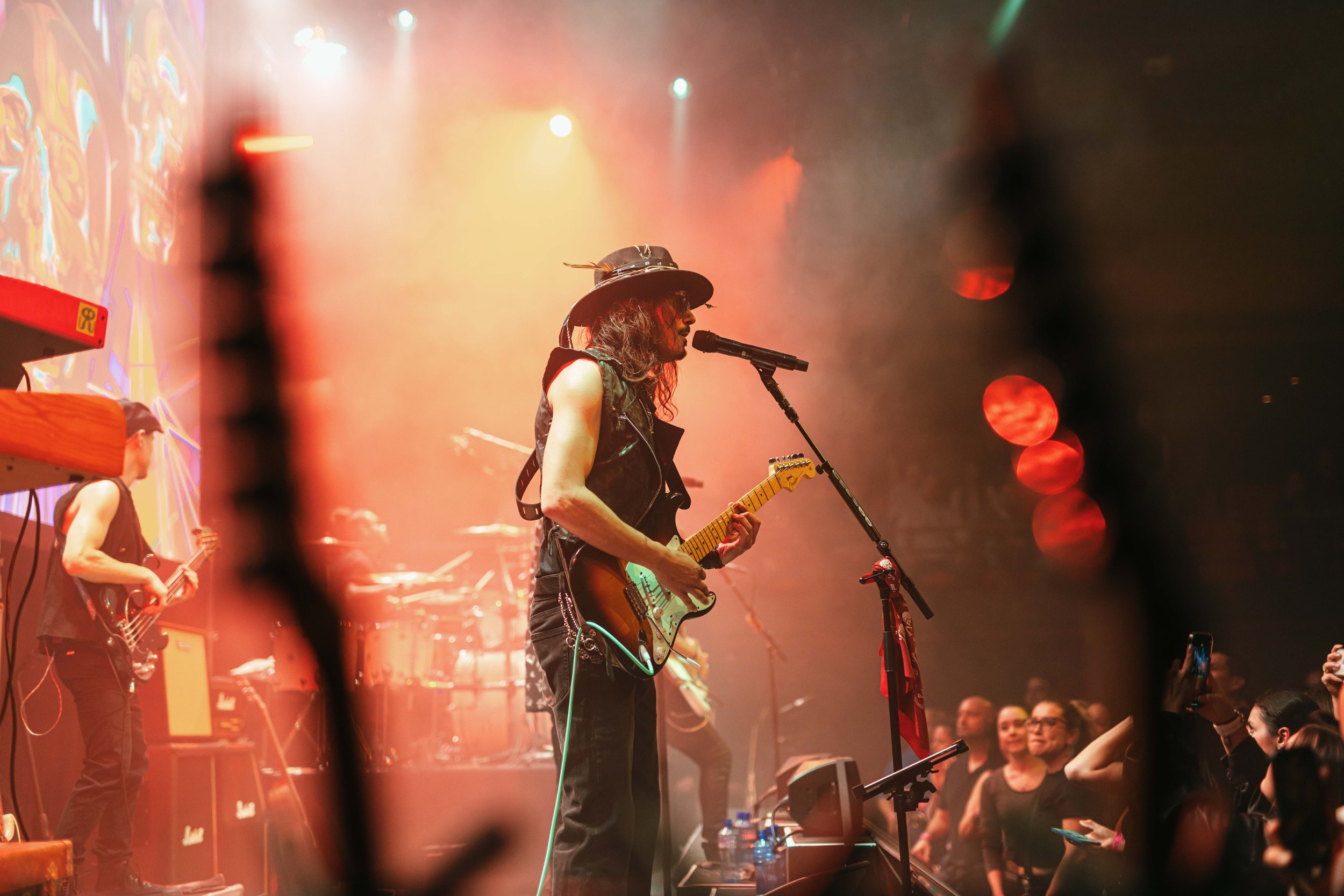 Bruno Yagüe playing electric guitar during a live concert