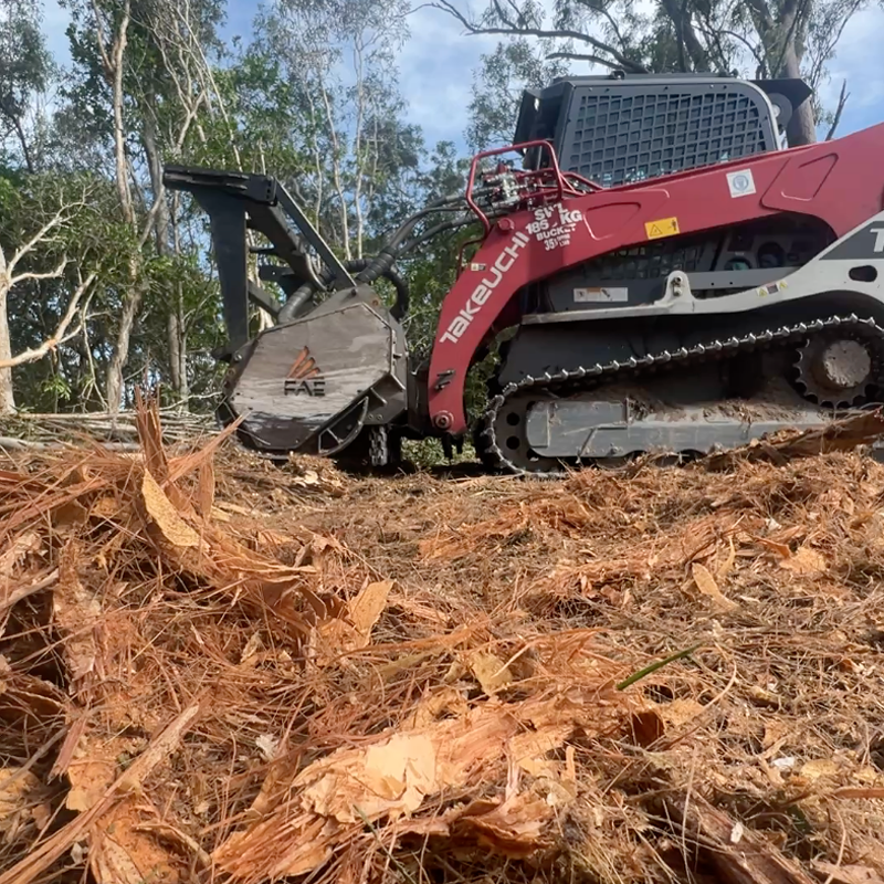 Close-up view of mulch produced by shredding trees on site.
