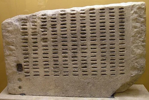 Kleroterion, Ancient Agora Museum, Athens. Photograph by Marsyas, via Wikimedia Commons. Licensed under CC BY-SA 2.5.