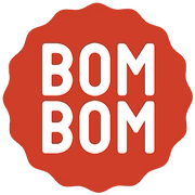 Red circular logo with white text that says 'BOM BOM' in the center.