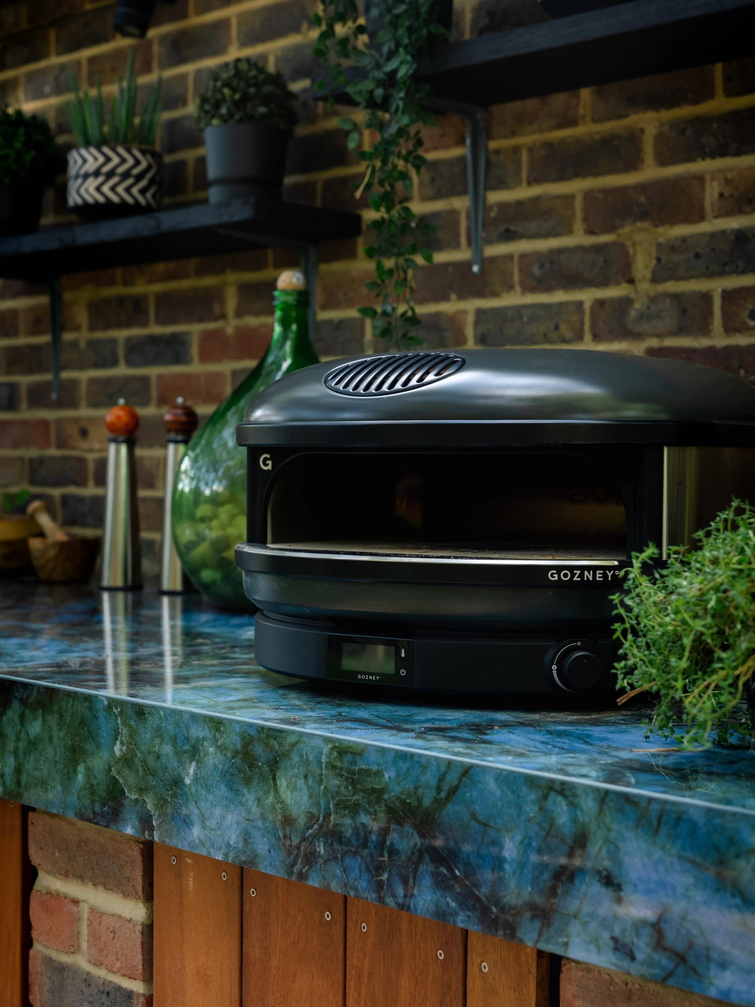 Outdoor Kitchen build and install by a garden design and landscaping serving surrey, hampshire, berkshire, camberley, ascot, london and surrounding areas. 