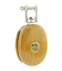 A wooden block with a metal bracket and a circular logo on the front.