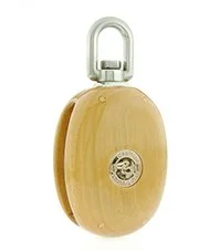 A wooden block with a metal bracket and a circular logo on the front.