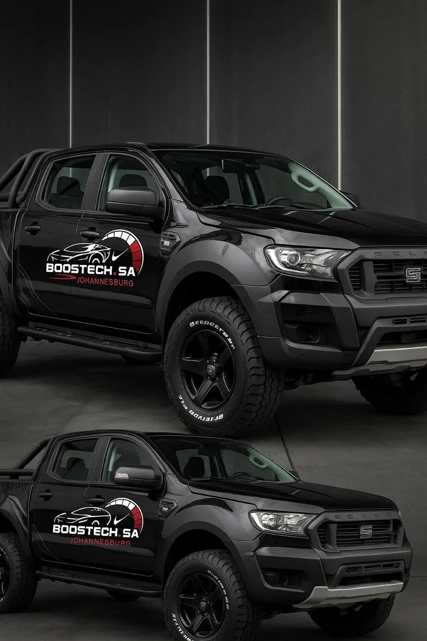 Black pickup truck with Boostech SA logo and Johannesburg text, parked indoors.